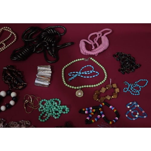 631 - A quantity of various costume bead necklaces etc, including buttons