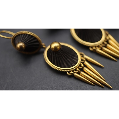 686 - A Victorian gold plated and jet 4-sectioned brooch, a pair of matching drop earrings with tassels