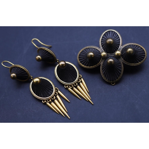 686 - A Victorian gold plated and jet 4-sectioned brooch, a pair of matching drop earrings with tassels