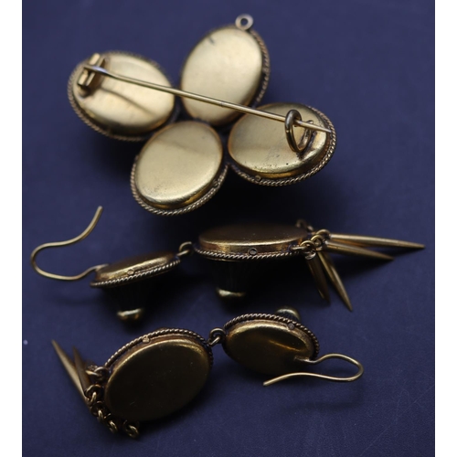 686 - A Victorian gold plated and jet 4-sectioned brooch, a pair of matching drop earrings with tassels