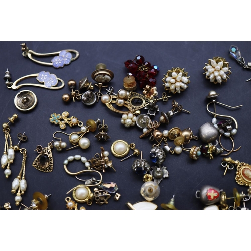 690 - A quantity of various earrings