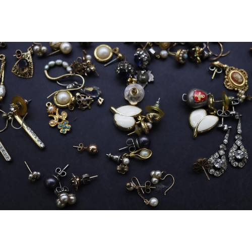 690 - A quantity of various earrings