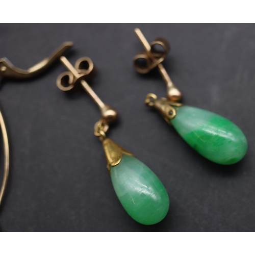 693 - A pair of gold and jade drop earrings and a pair of gold earrings mounted with small sapphires (4)