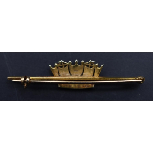 704 - A 9ct gold bar brooch mounted with crown motif, inset with half pearls, 3.9 grams gross