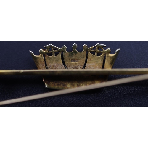 704 - A 9ct gold bar brooch mounted with crown motif, inset with half pearls, 3.9 grams gross