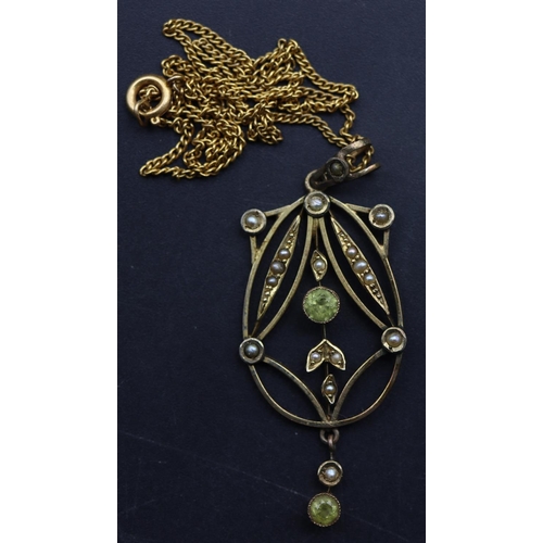 705 - An oval drop pendant set with pale green stones and half pearls, with later chain