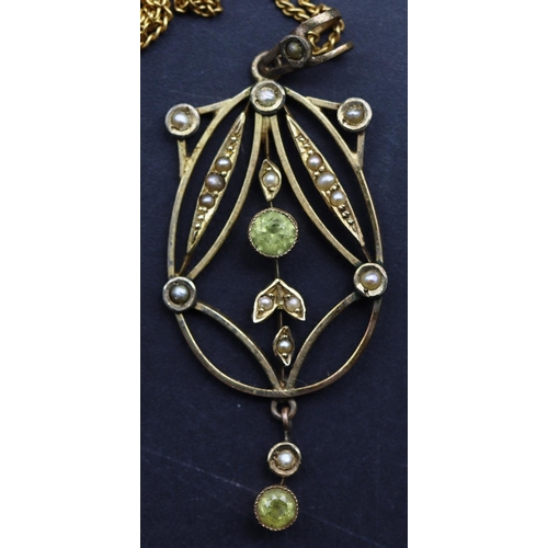 705 - An oval drop pendant set with pale green stones and half pearls, with later chain