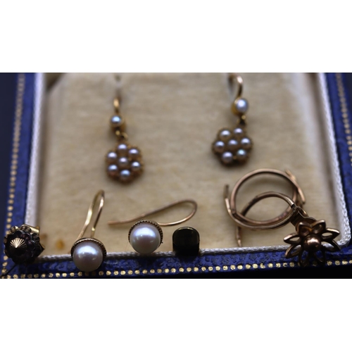 707 - A pair of gold drop earrings set with half pearls, a pair of small gold earrings set with pearls and... 