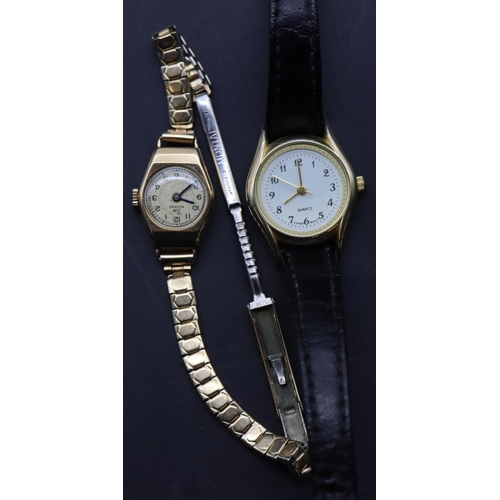 708 - A 9ct gold ladies' Record wristwatch with circular dial and Arabic numerals, later plated strap brac... 