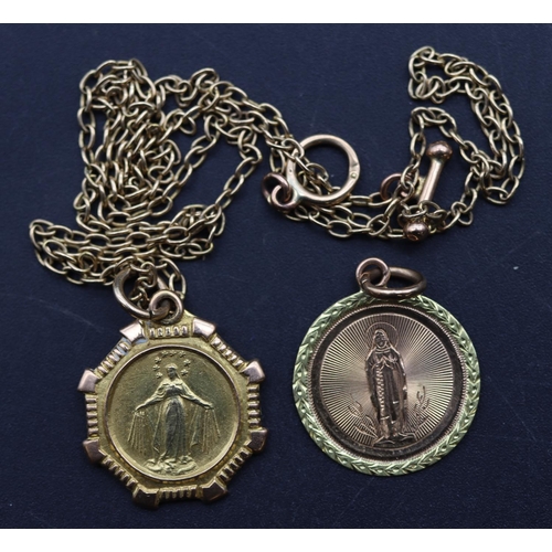 711 - A 9ct gold religious pendant with gold chain and a small  gold religious pendant, 7.3 grams (2)