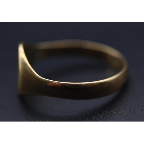 720 - An 18ct gold signet ring with engraved monogram, Size Q/R, 3.4 grams