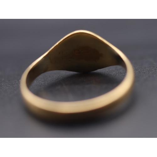 720 - An 18ct gold signet ring with engraved monogram, Size Q/R, 3.4 grams