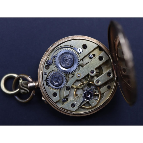 725 - A 14ct gold fob watch with gilt dial and Roman numerals, allover chased floral, leaf and scroll deco... 