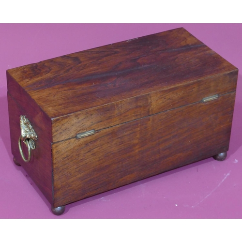 737 - A 19th Century rosewood rectangular shaped tea caddy with hinged lid enclosing 2 lidded compartments... 