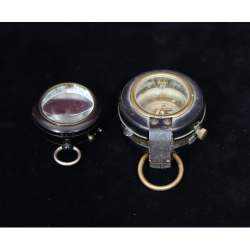 742 - Negretti & Zambra, London, black compass and a military brass and black compass (2)