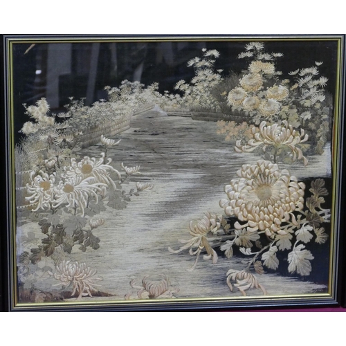 744 - 3 Chinese black silk framed panels depicting garden and floral decoration, in black and gilt frames,... 