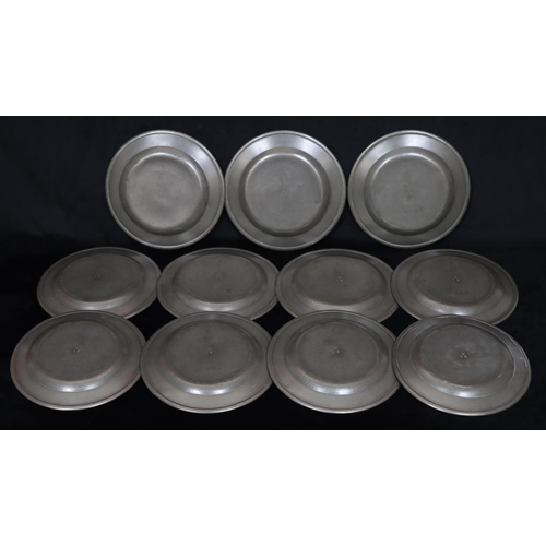 750 - A set of 11 antique pewter round plates, 23.6cm diameter