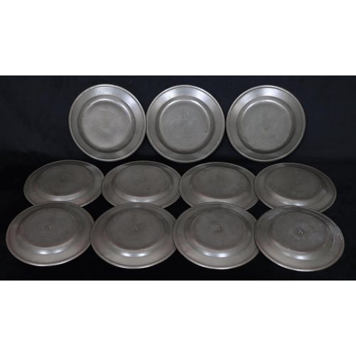 750 - A set of 11 antique pewter round plates, 23.6cm diameter