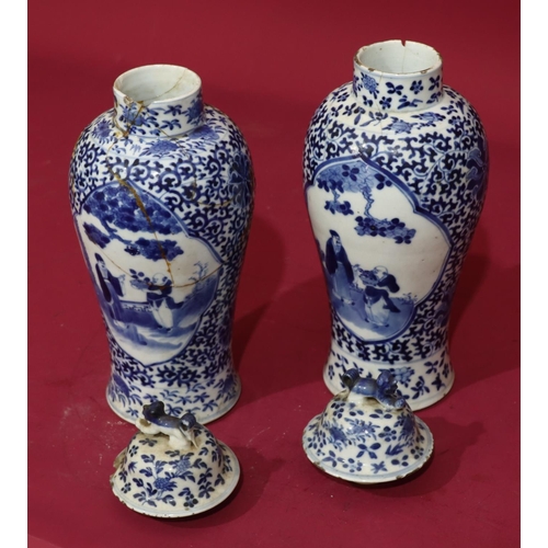 76 - A pair of 19th Century Chinese blue and white round bulbous thin neck lidded vases with figure, flor... 