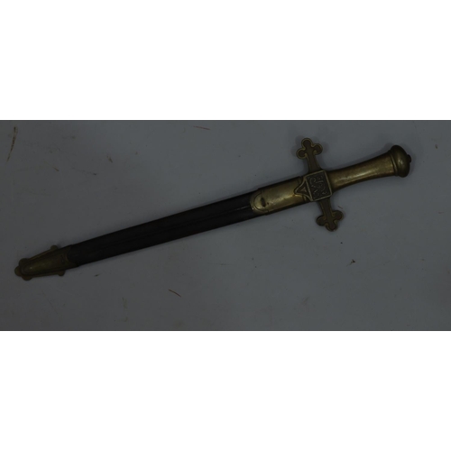 765 - A brass handled dagger with leather and brass sheath, 49.5cm long