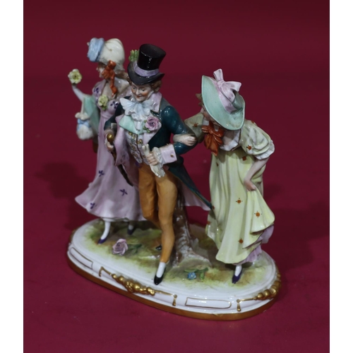 77 - A Continental china group of walking gentleman with 2 ladies (1 hand a/f), 20.5cm high