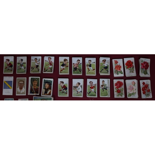 823 - A quantity of various silk and other cigarette cards including military crests, John Players, Footba... 