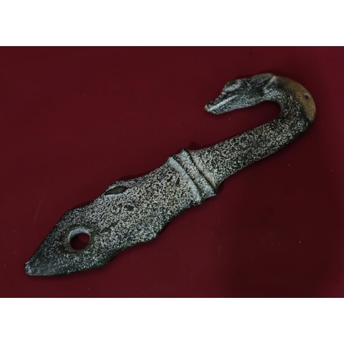 835 - A green hardstone ceremonial dagger with animal head motif, 36cm long