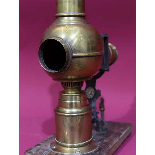 837 - A brass Magic Lantern with a quantity of various glass slides 