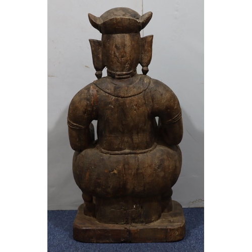 839 - A large South East Asian carved wooden figure of a seated Buddha on rectangular shaped base, 88.5cm ... 