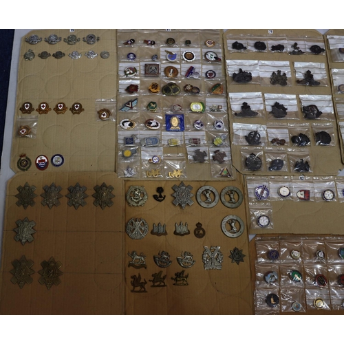 847 - A quantity of various military and other cap badges etc, including enamel badges mounted on 12 full ... 