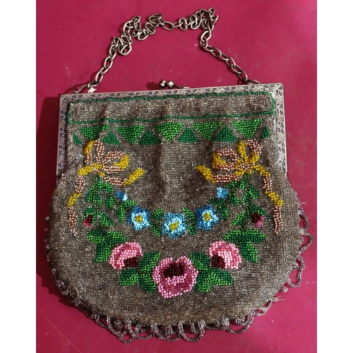 908 - A ladies' plated evening bag with multicoloured bead work with floral, ribbon and leaf decoration, w... 