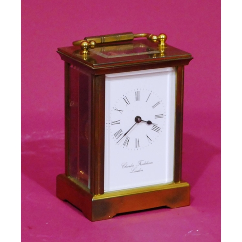 913 - Charles Frodsham, London, brass carriage clock with white enamel dial and Roman numerals, swing over... 