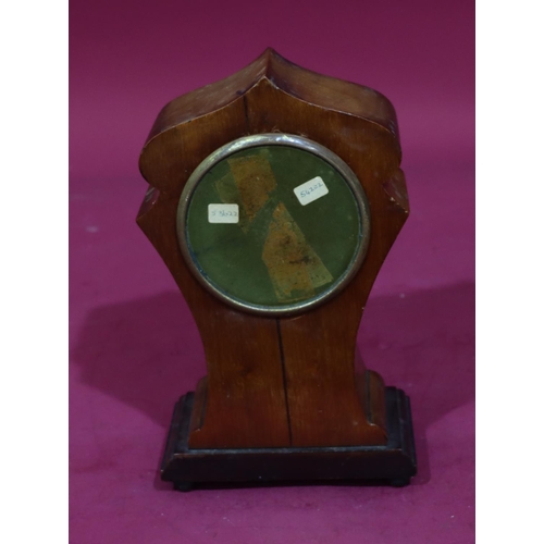 917 - An Edwardian mahogany timepiece with scallop shaped top and inlaid shell motif and stringing, white ... 