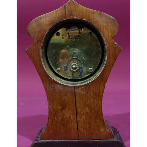 917 - An Edwardian mahogany timepiece with scallop shaped top and inlaid shell motif and stringing, white ... 