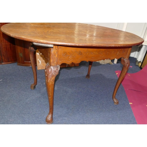 931 - An 18th Century Dutch oval marquetry table with allover floral, leaf, scroll, stringing and shell de... 