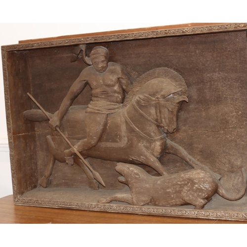 933 - A 19th Century wood carved Eastern heavy Dagestan style panel depicting warrior holding a spear on h... 