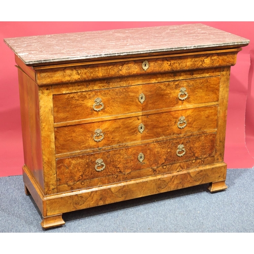 935 - A Continental walnut straight front commode with black marble top, 4 long drawers below with drop br... 