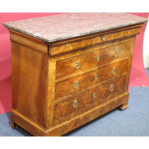 935 - A Continental walnut straight front commode with black marble top, 4 long drawers below with drop br... 