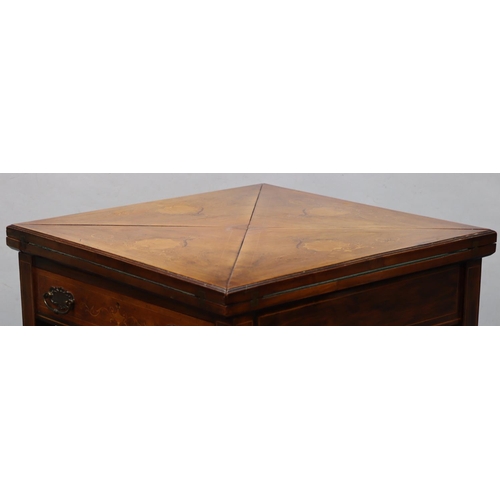 938 - A 19th Century walnut envelope card table with inlaid marquetry shell, scroll and stringing decorati... 