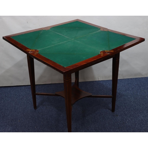 938 - A 19th Century walnut envelope card table with inlaid marquetry shell, scroll and stringing decorati... 