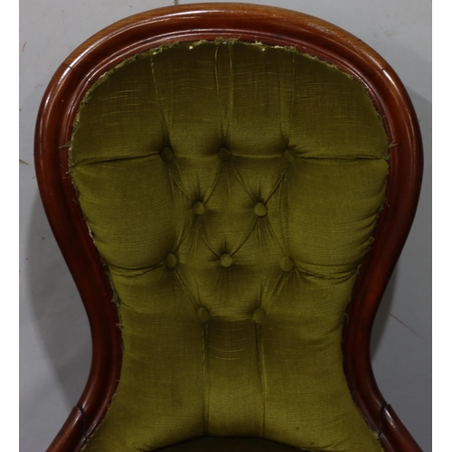 940 - A 19th Century mahogany spoon back nursing chair with green velvet overstuffed seat and button back ... 