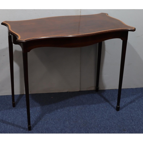 946 - An Edwardian mahogany rectangular scallop shaped occasional table with inlaid banding on square reed... 