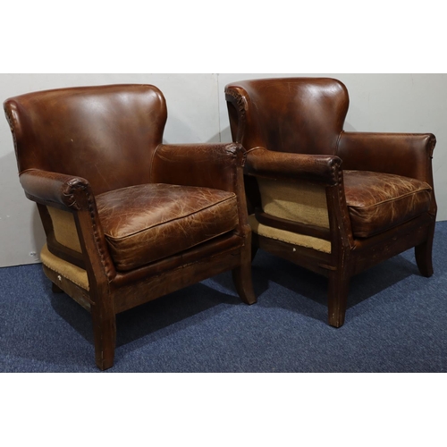 950 - A pair of wooden framed small brown leather tub chairs on splayed front feet, 72cm wide, 69cm deep, ... 