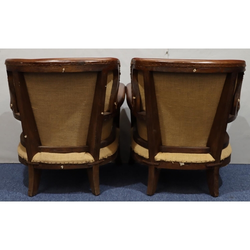 950 - A pair of wooden framed small brown leather tub chairs on splayed front feet, 72cm wide, 69cm deep, ... 