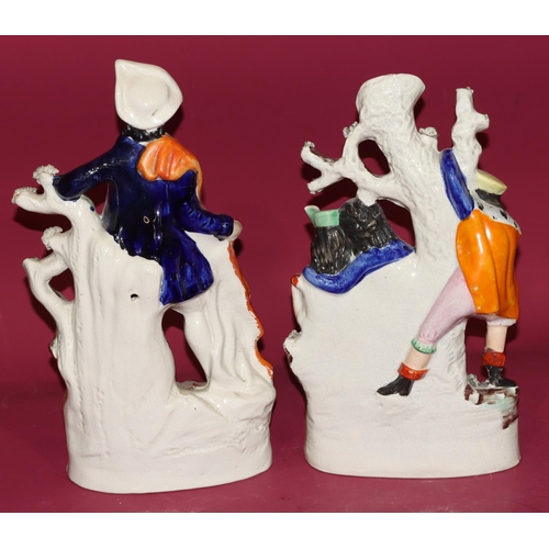 98 - A 19th Century Staffordshire group The Rivals, 33cm high and a 19th Century Staffordshire figure She... 