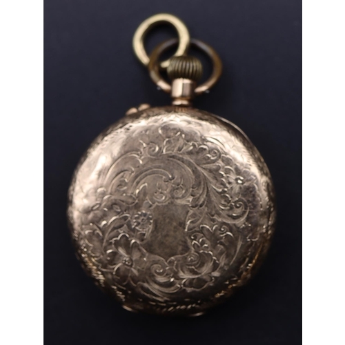 725 - A 14ct gold fob watch with gilt dial and Roman numerals, allover chased floral, leaf and scroll deco... 