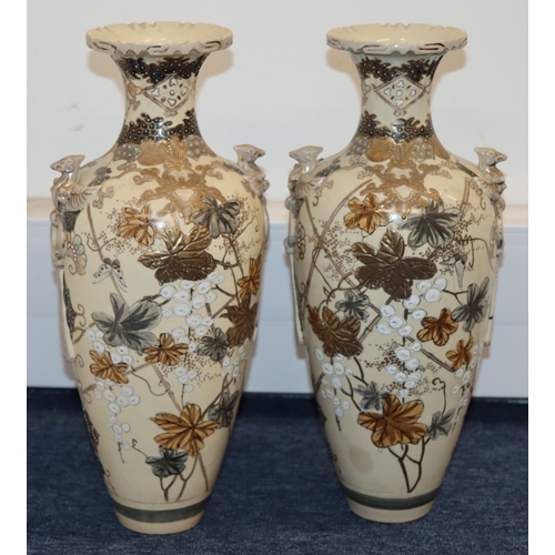 1008 - A pair of 20th Century Satsuma vases on cream ground with multi-coloured figure, floral and gilt dec... 