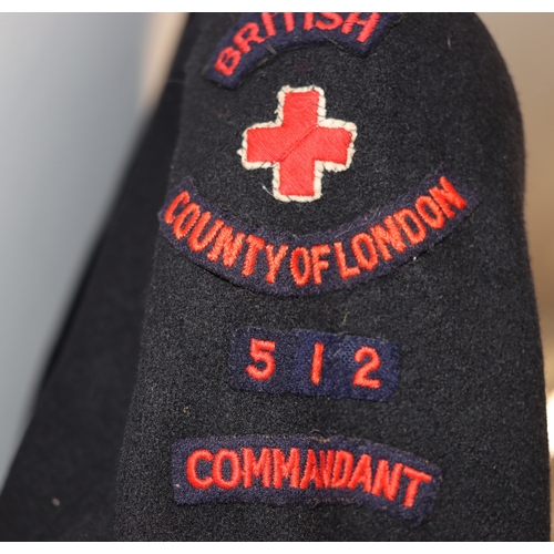 1016 - A black British Red Cross Society County of London full length wool coat.