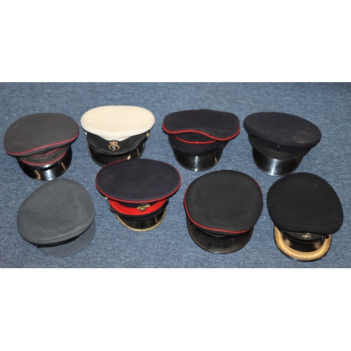 1019 - A large quantity of various military hats, including a red beret, Germany G.u.F.Brand army side hats... 