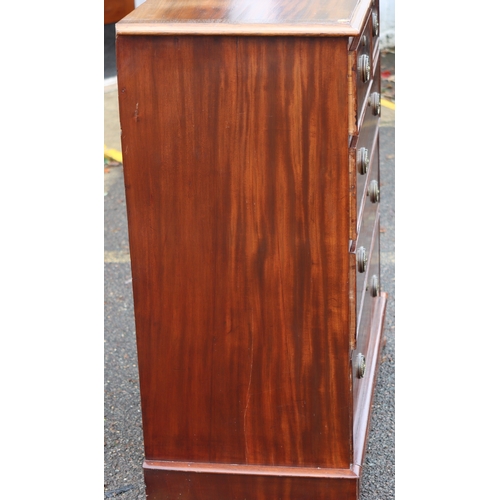 1023 - A mahogany straight front chest of drawers on bun feet, 98cm wide, 47cm deep, 110cm high. This Lot i... 